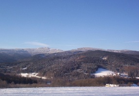 Panorama with the peak of Ostrý mountain