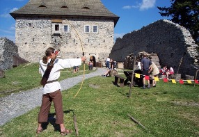 Crossbow shooting, archery or small cannon shooting offered by the archer at the castle court